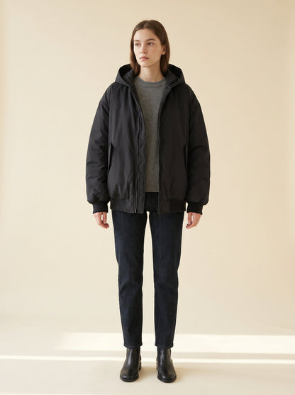 Black oversized hooded bomber jacket by Lode Lane