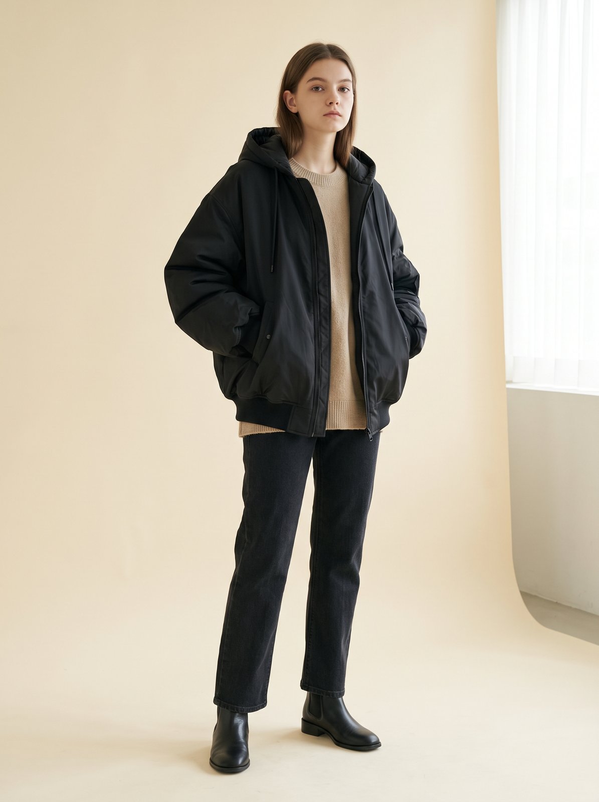 Black oversized hooded bomber jacket by Lode Lane