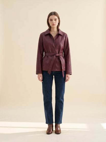Burgundy belted faux leather jacket by Lode Lane