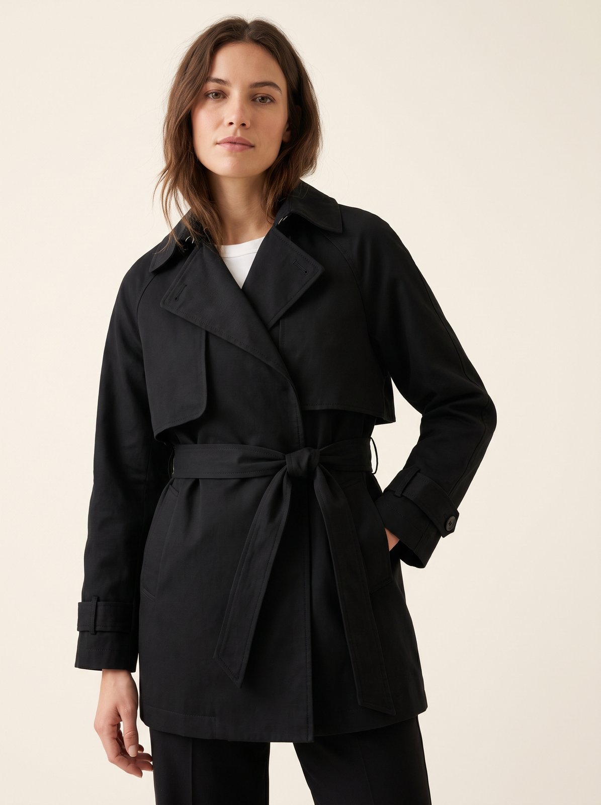 Black short belted trench coat by The Lode Lane