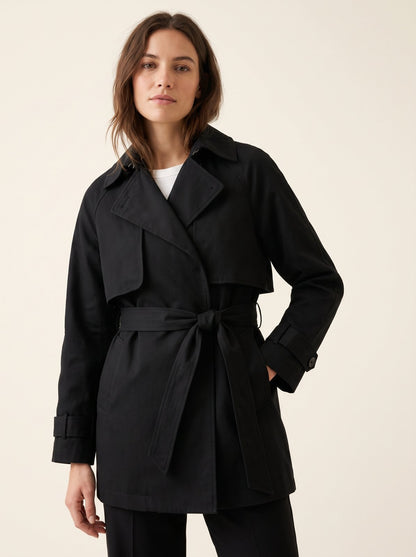 Black short belted trench coat by The Lode Lane
