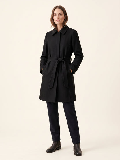 Black short belted trench coat by The Lode Lane