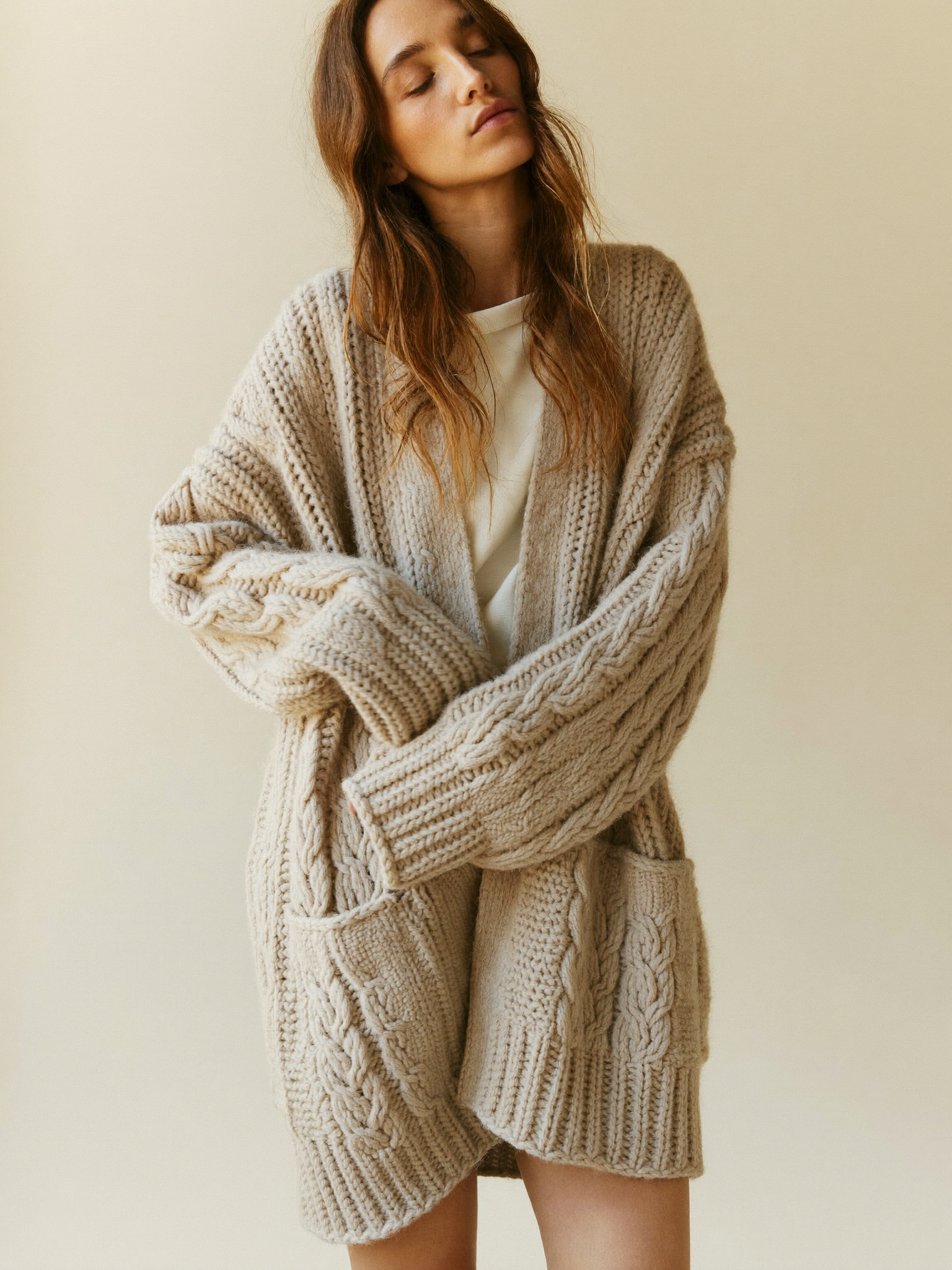 Oatmeal chunky cable-knit open-front cardigan by Lode Lane