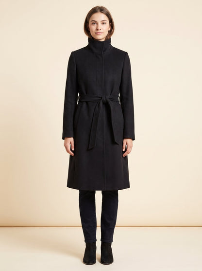 Black funnel neck belted trench coat by Lode Lane