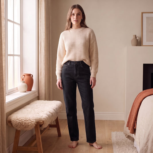 Nova black straight-leg jeans with a cream knit by The Lode Lane