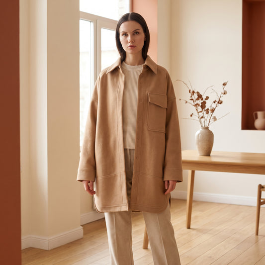Leona camel wool shacket worn open over a cream knit by The Lode Lane
