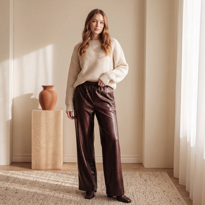 Simone burgundy faux-leather wide-leg pants with a cream knit by The Lode Lane