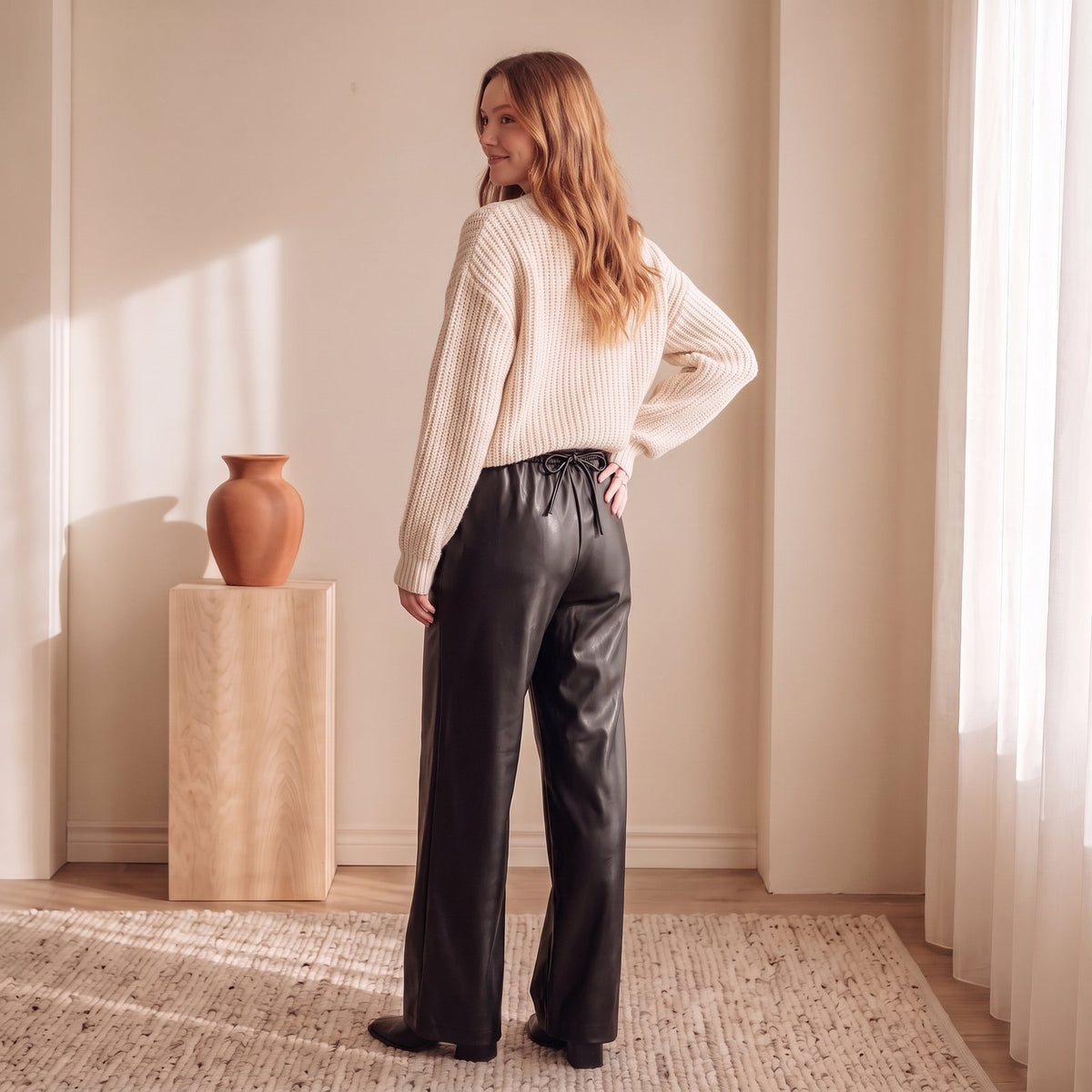 Women's black faux-leather wide-leg trousers, back view – The Lode Lane