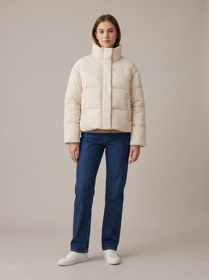 Cream cropped puffer jacket by Lode Lane