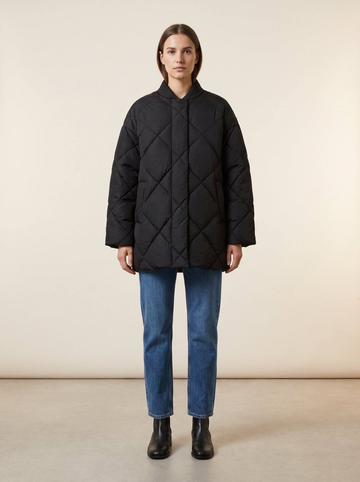 Black oversized quilted puffer jacket by Lode Lane