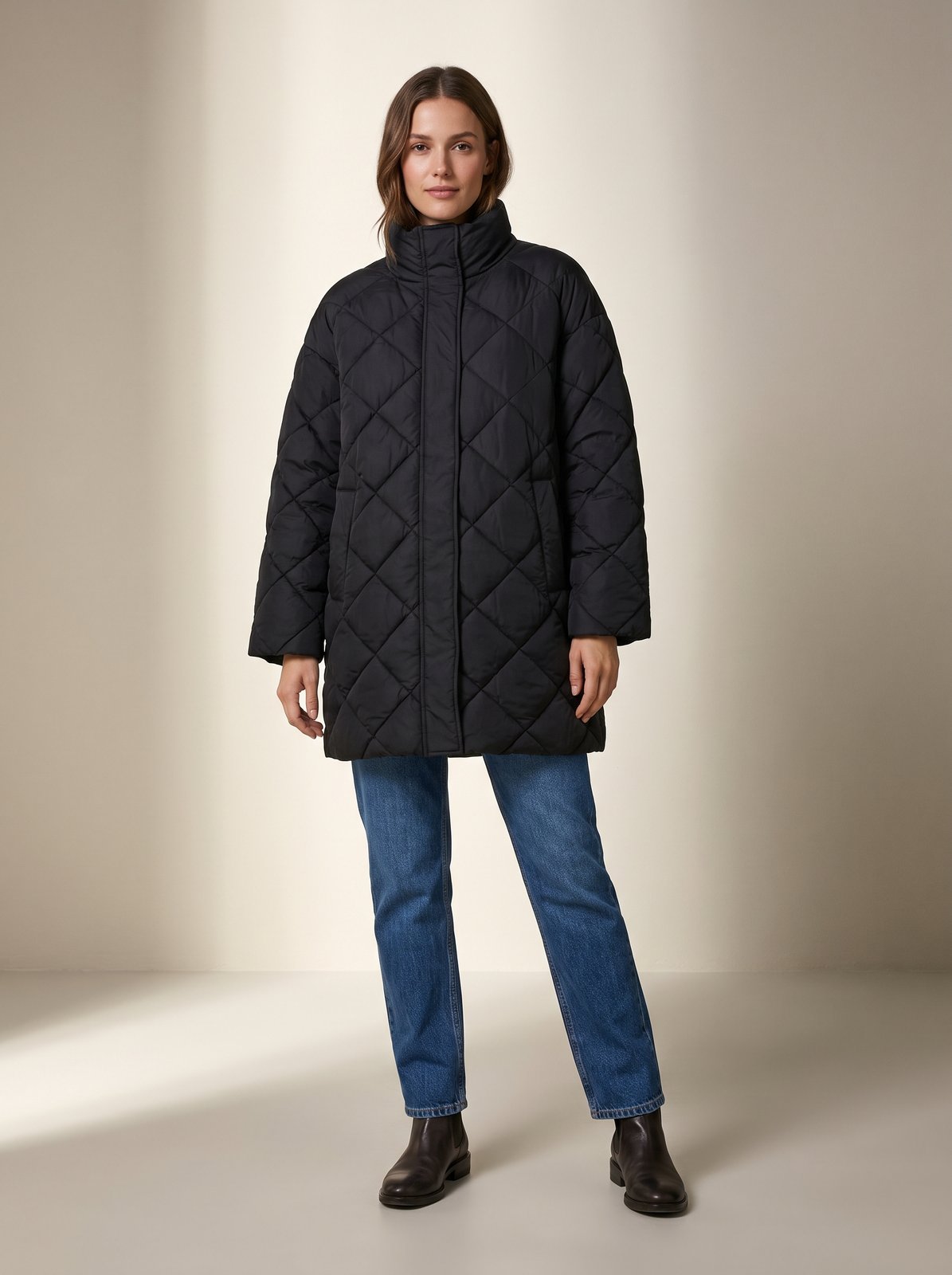 Black oversized quilted puffer jacket by Lode Lane