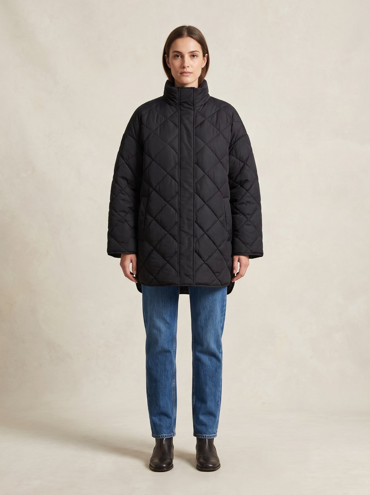 Black oversized quilted puffer jacket by Lode Lane