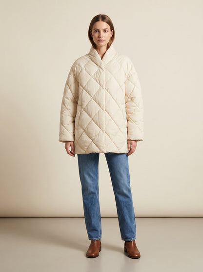 Cream oversized quilted puffer jacket by Lode Lane