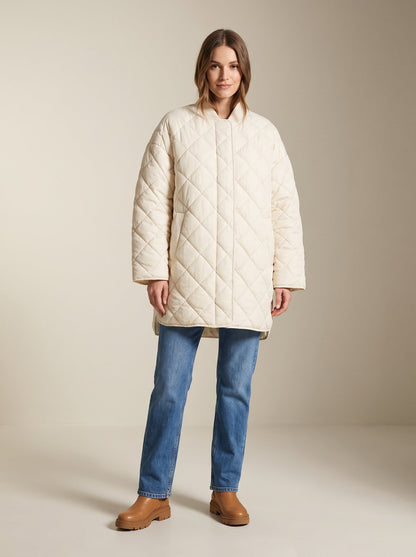 Cream oversized quilted puffer jacket by Lode Lane