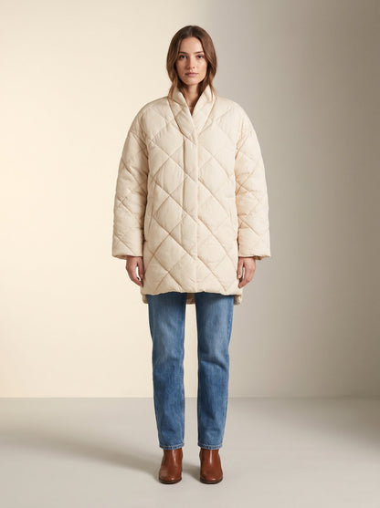 Cream oversized quilted puffer jacket by Lode Lane