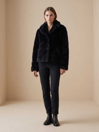 Black faux fur teddy jacket by Lode Lane