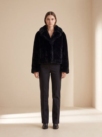 Black faux fur teddy jacket by Lode Lane