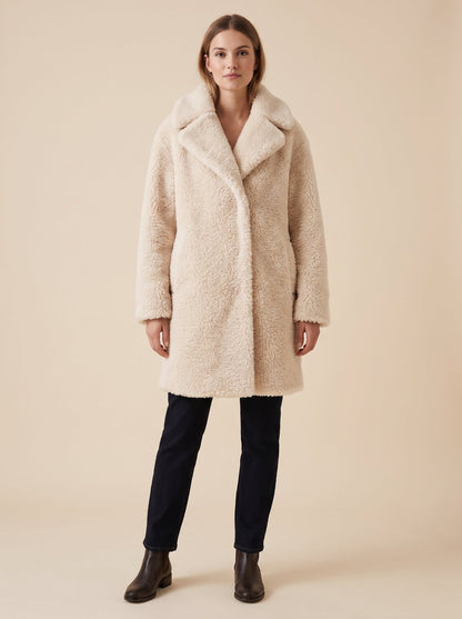 Cream faux shearling teddy coat by Lode Lane